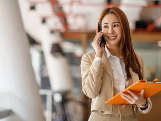 Charming Asian Businesswoman manager smile standing