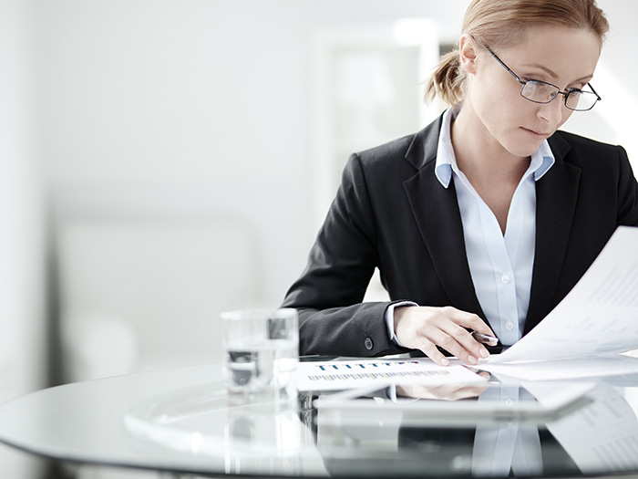businesswoman reviewing document